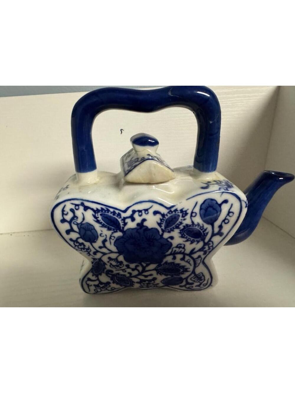 Vintage Blue and White Ceramic Teapot with Floral Design